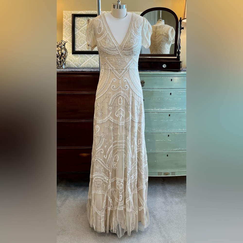 BHLDN wedding dress brand new with tags size 4 color is called champagne